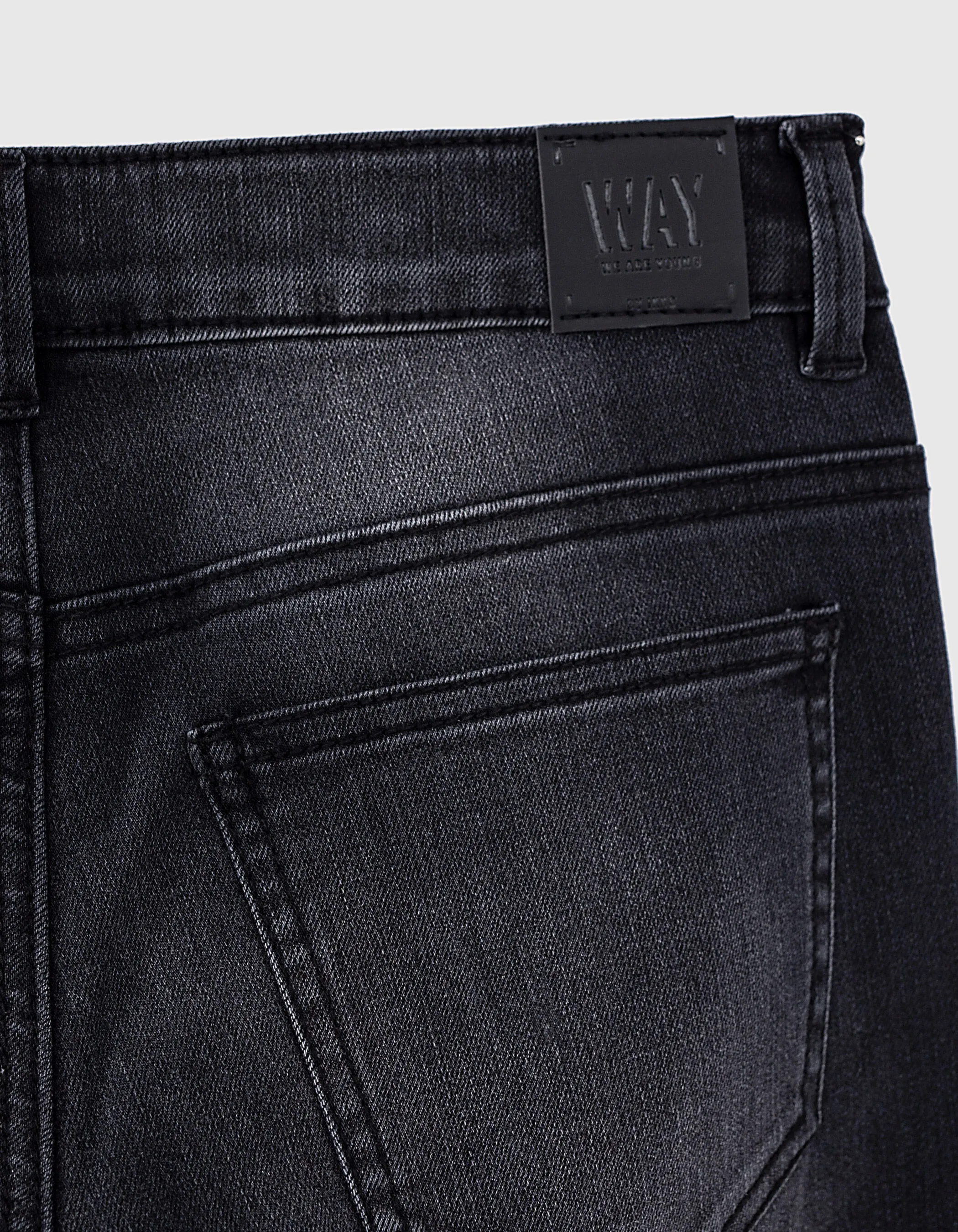 Jean slim black used avec usures cousues garçon 